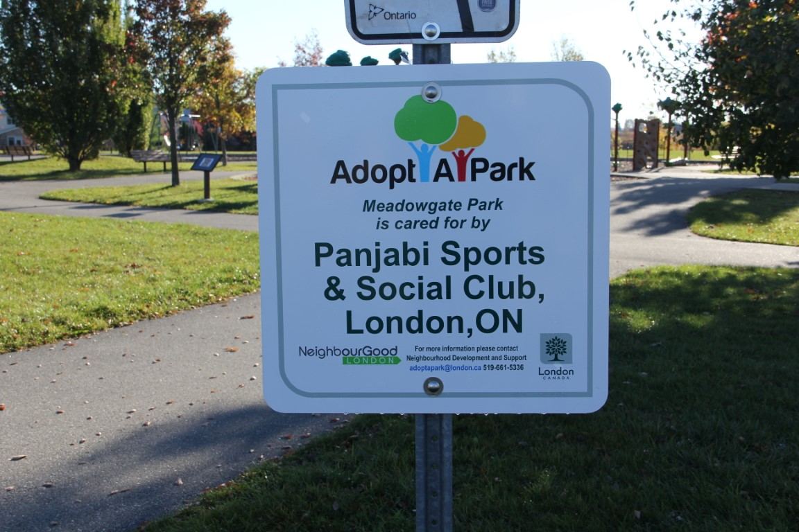 City of London Adopt-a-Park sign reading Meadowgate Park is cared for by Panjabi Sports and Social Club, London, ON
